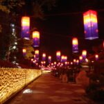 A beautifully lit street in Namwon, South Korea, adorned with colorful hanging lanterns at night.